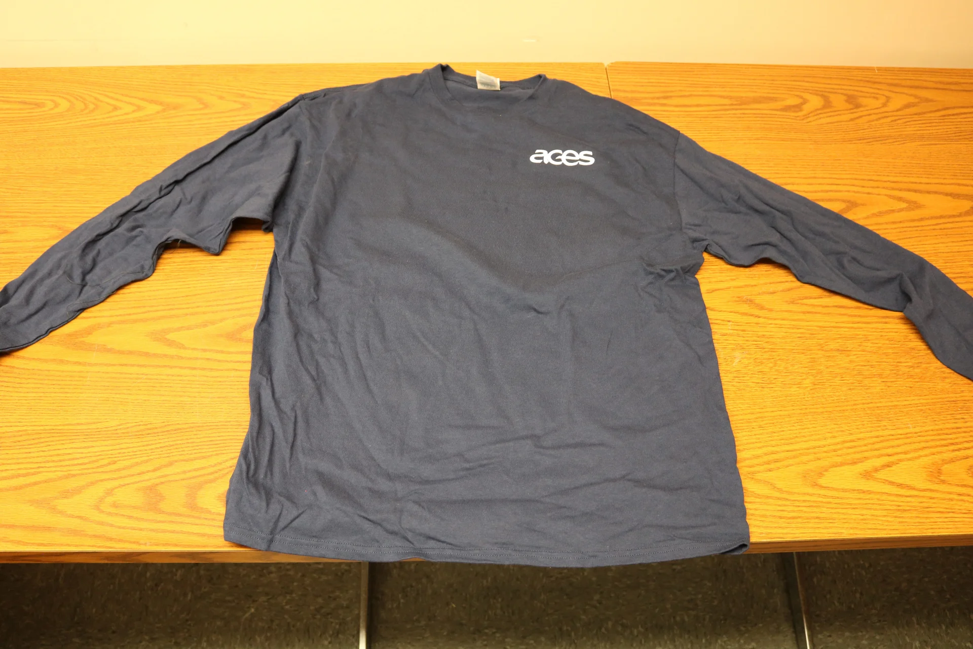 Black Long Sleeve shirt with white ACES logo